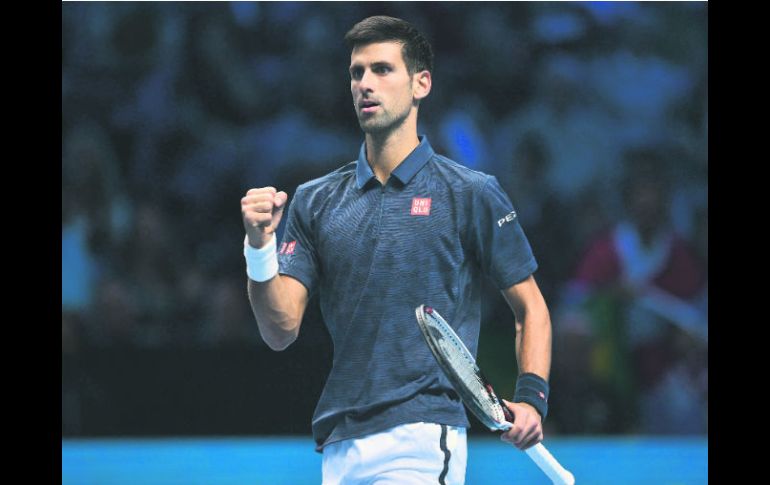 Djokovic tuvo un complicado encuentro ante el canadiense Raonic, pero supo sacar el juego. AFP / G. Kirk