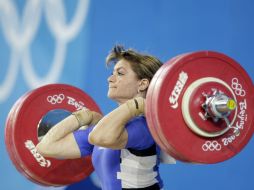 La medallista de plata Irina Nekrassova, está entre los atletas que perderán sus preseas. AP / ARCHIVO