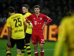 Bayern controló el partido por largos tramos, pero no pudo superar a la ordenada defensa de Dortmund. AFP / P. Stollarz