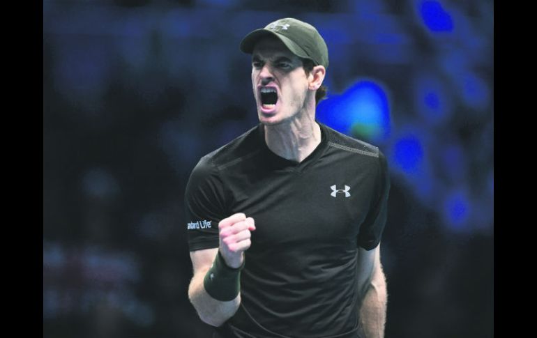 Andy Murray reacciona tras ganar el maratónico partido de Semifinales ante el canadiense Milos Raonic ayer en Londres. AFP / G. Kirk