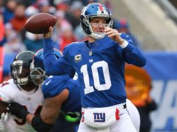 Eli Manning conectó 21 de 36 pases para 227 yardas. AFP / M. Reaves