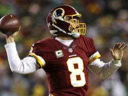 Kirk Cousins logró tres pases de anotación para los Pieles Rojas. AFP / P. Smith