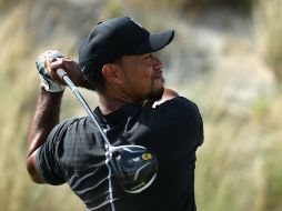 Woods, de 40 años y ganador de 14 torneos de Grand Slam, se lanzó este día junto a su compatriota Patrick Reed. AFP / C. Petersen