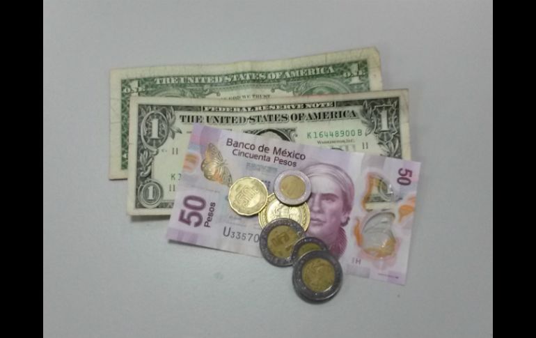 La moneda norteamericana se ofrece en un máximo de 20.95 pesos y se adquiere en un mínimo de 19.40 pesos. EL INFORMADOR / ARCHIVO