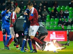 El objeto alcanzó al guardameta luso que acababa de recibir un gol. AFP / J. C. Verhaegen