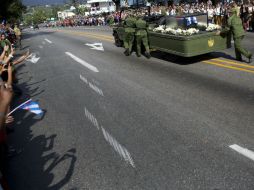 El avance del cortejo fúnebre por Santiago de Cuba contó con fuertes medidas de seguridad. AP / R. Abd