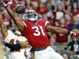 Un pase de touchdown de 25 yardas a Johnson con 11:09 por jugar puso a Arizona en ventaja 24-20. AFP / R. Freso