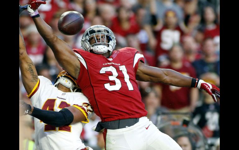 Un pase de touchdown de 25 yardas a Johnson con 11:09 por jugar puso a Arizona en ventaja 24-20. AFP / R. Freso