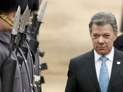 Santos ha dicho que lo recibiría en nombre de los colombianos, pero sobre todo de las víctimas del conflicto”. AFP / ARCHIVO