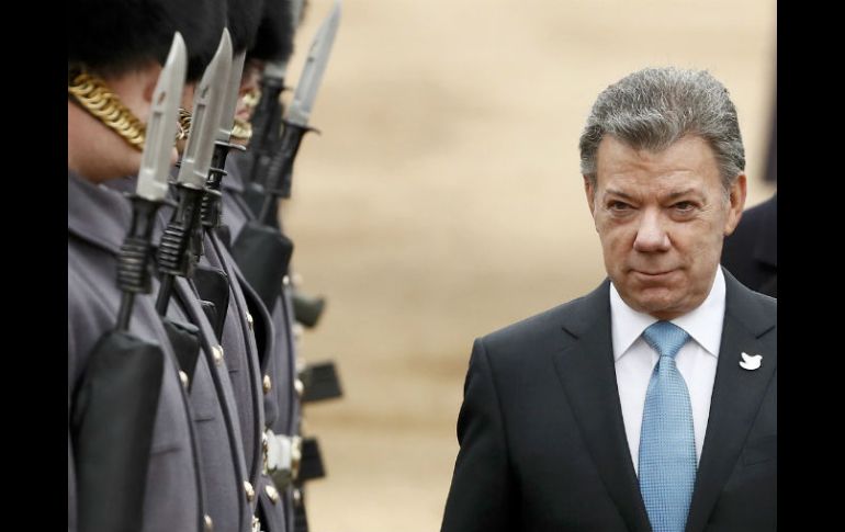 Santos ha dicho que lo recibiría en nombre de los colombianos, pero sobre todo de las víctimas del conflicto”. AFP / ARCHIVO