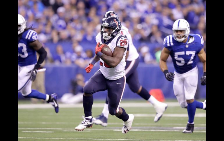 Lamar Miller anotó el único touchdown de Houston y la defensa de los Texanos frenó a Andrew Luck. AFP / A. Lyons