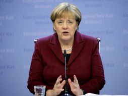 Merkel dijo que tanto Rusia como Irán deben asumir sus responsabilidades en Siria. AP / O. Matthys