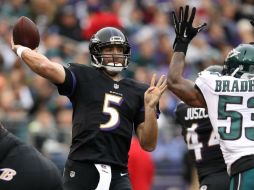 Cuando restaban poco más de seis minutos Joe Flacco vio interceptado un pase. AFP / P. Smith