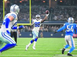 Dez Bryant figuró anoche frente a los Lions, al tener cuatro recepciones (dos de ellas de anotación) para 70 yardas. AP / B. Wade