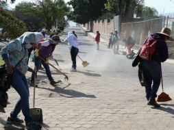 Habitantes de la comunidad se unieron para realiar la jornada de limpieza intensa en la zona. ESPECIAL / flickr / Gobierno de Tlajomulco