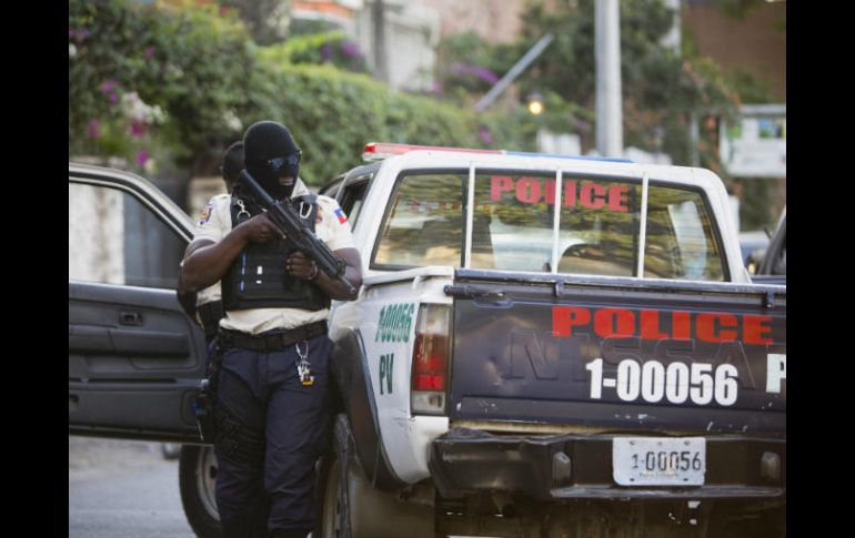 Philipe fue arrestado por agentes de la Policía Nacional Haitiana cuando salía de una estación radial. AP / D. Nalio