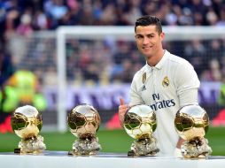 Ganador de la Champions y de la Eurocopa con Portugal en 2016, Ronaldo se impuso a Leo Messi y Antoine Griezmann. AFP / G. Julien