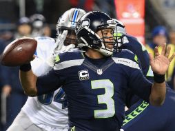 Russell Wilson logró dos pases de anotación en un ataque aéreo de 224 yardas y llevó a su equipo a la victoria. AFP / S. Dykes