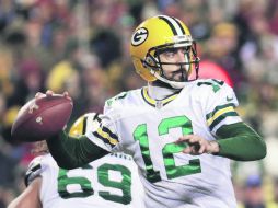 En un encuentro frente a los Giants en postemporada en su carrera, Aaron Rodgers pasó para 264 yardas. AFP / ARCHIVO