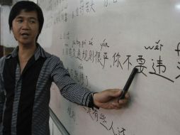 El ''pinyin'' es la base con la que los caracteres del mandarín pudieron ser introducidos en ordenadores y móviles. AP / ARCHIVO