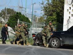 Carlos Joaquín González indicó que tras pedir el apoyo del gobierno de la República, fuerzas federales ya van en camino. AFP / E. Grajales