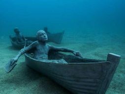 El artista británico Jason deCaires Taylor es famoso por su trabajo submarino, como estas piezas en España. ESPECIAL / underwatermuseumlanzarote.com