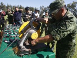 En la explanada “Damián Carmona”, en el Campo Militar 1A, fueron destruidas tres mil 604 armas y 12 mil 567 cargadores. EL INFORMADOR / ARCHIVO