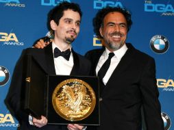 El cineasta entregó el premio a Damien Chazelle, ganador de este por 'La La Land'. AFP / M. Ralston