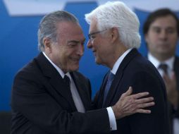 Michel Temer y Wellington Moreira. La suspensión será revisada por un juzgado de segunda instancia. EFE / J. Alves