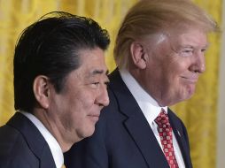 El primer ministro nipón, Shinzo Abe y el presidente estadounidense, Donald Trump. AFP / M. Ngan