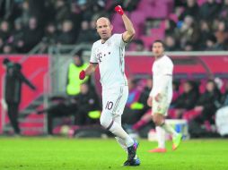 Cierre. El holandés Arjen Robben puso cifras definitivas a favor del Bayern, ayer frente al Ingolstadt. AFP / C. Stache