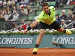 Wawrinka, número tres del mundo, buscará este 2017 su primer título en el suroeste de la capital británica. AP / ARCHIVO