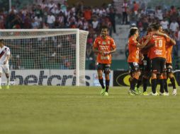 Jonathan Fabbro festeja su gol para Jaguares. MEXSPORT / N. García