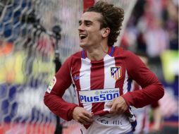 Griezmann celebra una de sus anotaciones dedicándosela a su esposa. AFP / J. Soriano