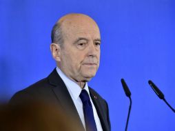 Alain Juppe durante la conferencia de prensa en la que anunció su decisión. AFP / G. Gobet