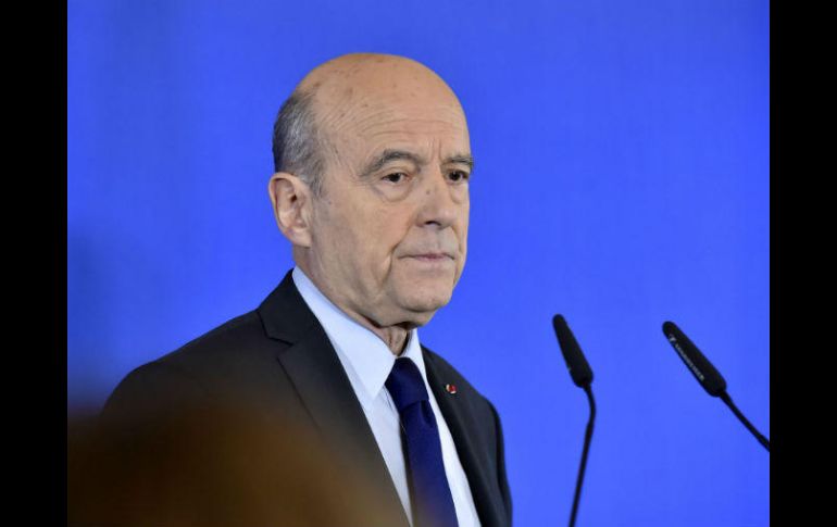 Alain Juppe durante la conferencia de prensa en la que anunció su decisión. AFP / G. Gobet