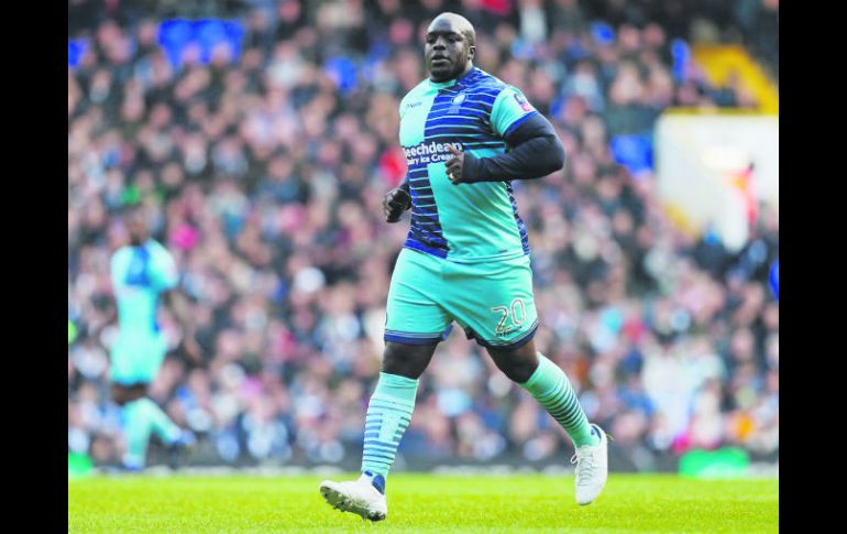 Adebayo Akinfenwa. Con sus 102 kilos de peso, el inglés es considerado como el jugador de futbol más fuerte y pesado del mundo. AP /