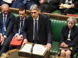 El secretario de Economía, Phillip Hammond, reconoce que el déficit bajó, pero la deuda es todavía muy alta. AFP / Parlamento del Reino Unido