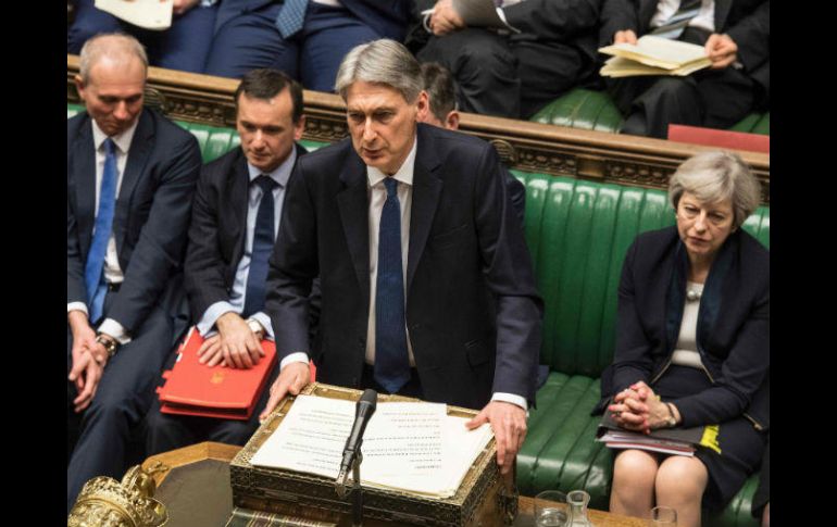 El secretario de Economía, Phillip Hammond, reconoce que el déficit bajó, pero la deuda es todavía muy alta. AFP / Parlamento del Reino Unido