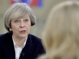 La primera ministra británica Theresa May tiene previsto dar ese paso este 29; iniciaría un periodo de dos años de diálogo. AP / ARCHIVO