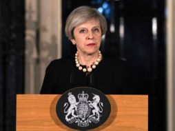 May, que leyó su mensaje vestida de negro, estaba en el Parlamento cuando ocurrió el ataque. AFP / R. Pohle