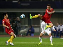 China vence a un rival al que sólo había ganado una vez en su historia, con el solitario gol. AFP /