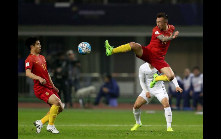 China vence a un rival al que sólo había ganado una vez en su historia, con el solitario gol. AFP /