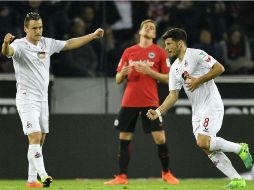 Milos Jojic (D) celebra el tanto que da la victoria a Colonia. AP / M. Meissner