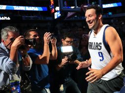 Romo fue incluido como uno más de los Mavs rumbo al encuentro con Denver Nuggets. AFP / R. Martínez