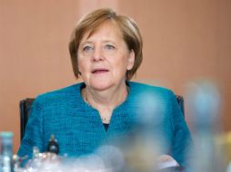 Merkel dice que se espera que el partido que fue reprogramado para este miércoles sea ''pacífico y bueno''. AFP / S. Loss