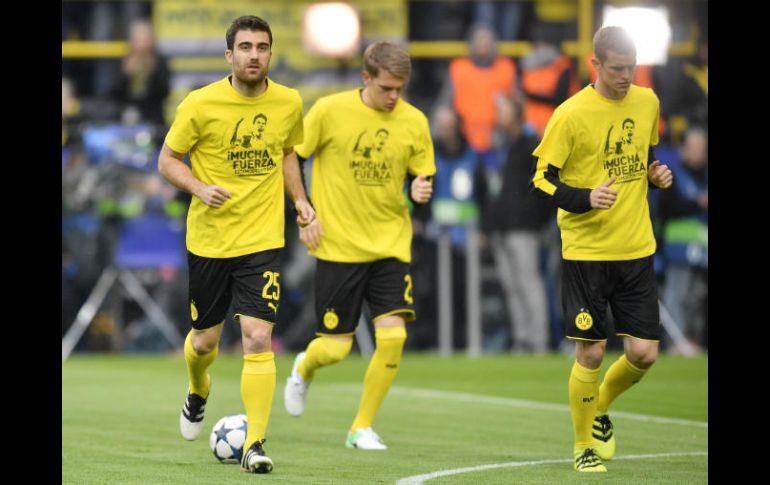 El mensaje que aparece en la playera de práctica del equipo aludía al jugador, que se recupera tras ser operado. AP / M. Meissner