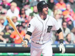 Toletazo. Andrew Romine conectó grand slam en la cuarta entrada para encaminar a los Tigres a la victoria ante los Mellizos. AFP /  l. Halip