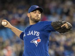 Marco Estrada permitió tres imparables, otorgó dos bases por bolas y ponchó a siete enemigos. AFP / F. Thornhill