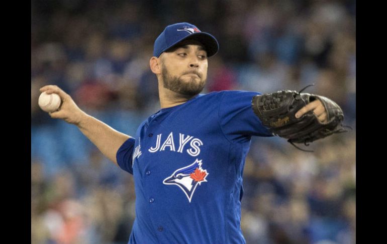 Marco Estrada permitió tres imparables, otorgó dos bases por bolas y ponchó a siete enemigos. AFP / F. Thornhill